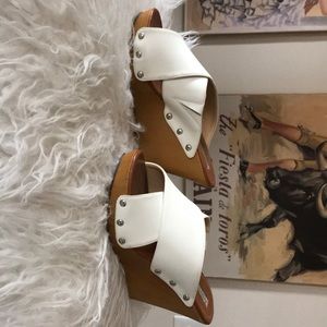 White wedge sandals.